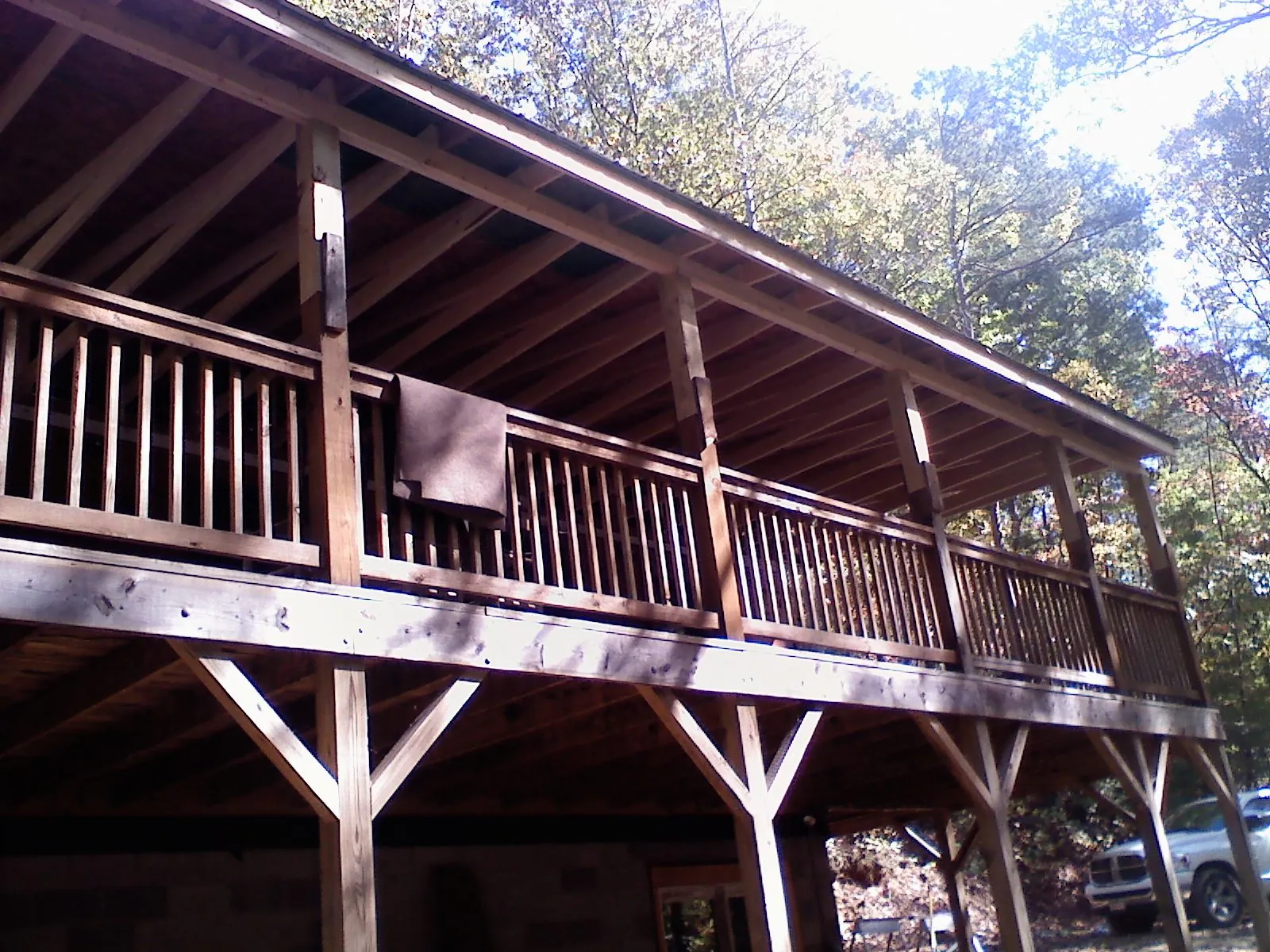 Timber framing under a new elevated porch and deck — Roof Leak Repair in Defiance by Roofing Brothers